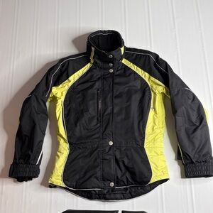 Obermeyer Ridgeline Weather X System women's ski jacket in black & neon yellow.